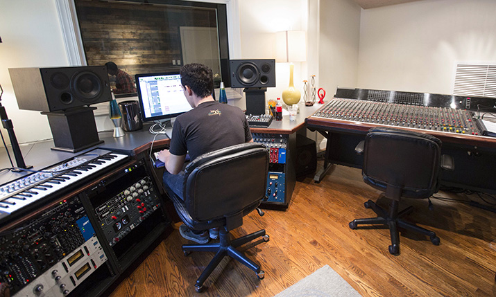 Student works in the Recording Studio of the Commercial Music department.