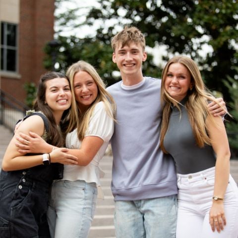 3 female students and 1 male student