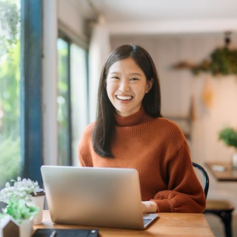 student on Laptop