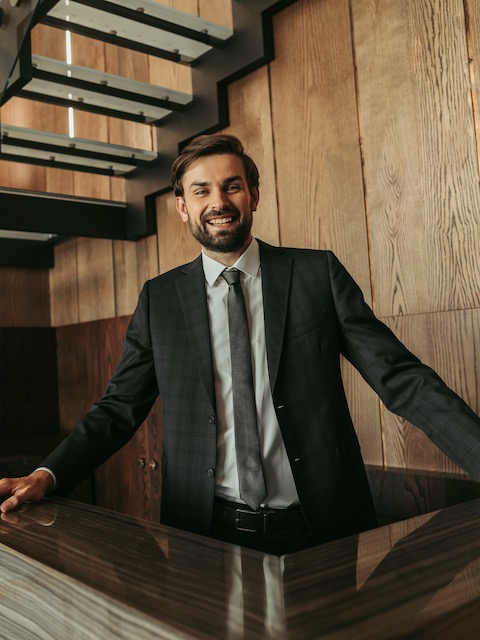 Concierge behind desk at hotel