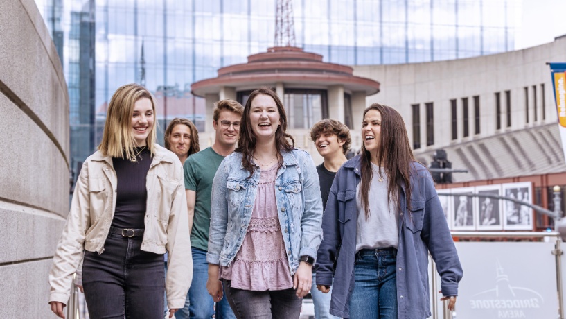 students walking downtown