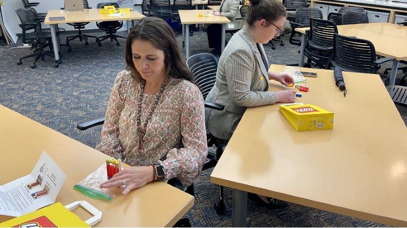 students working with Legos