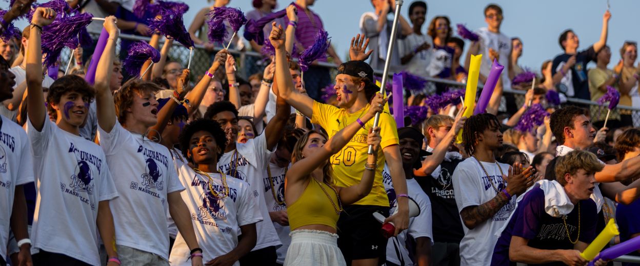 Lippy Lunatics Section cheering at a soccer game