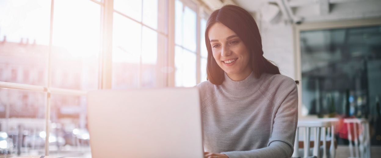 Female Online Student on her Laptop