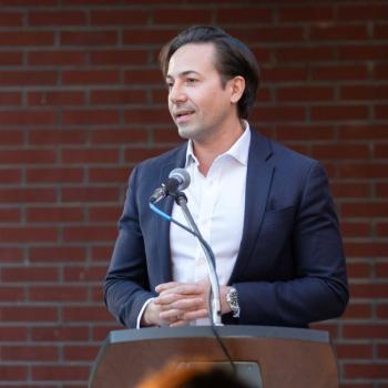 Marcus Geromes speaking at the reunion