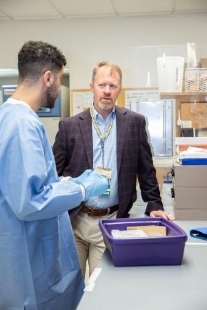 Dr. Eric Guthrie with alumnus Timothy Khalil