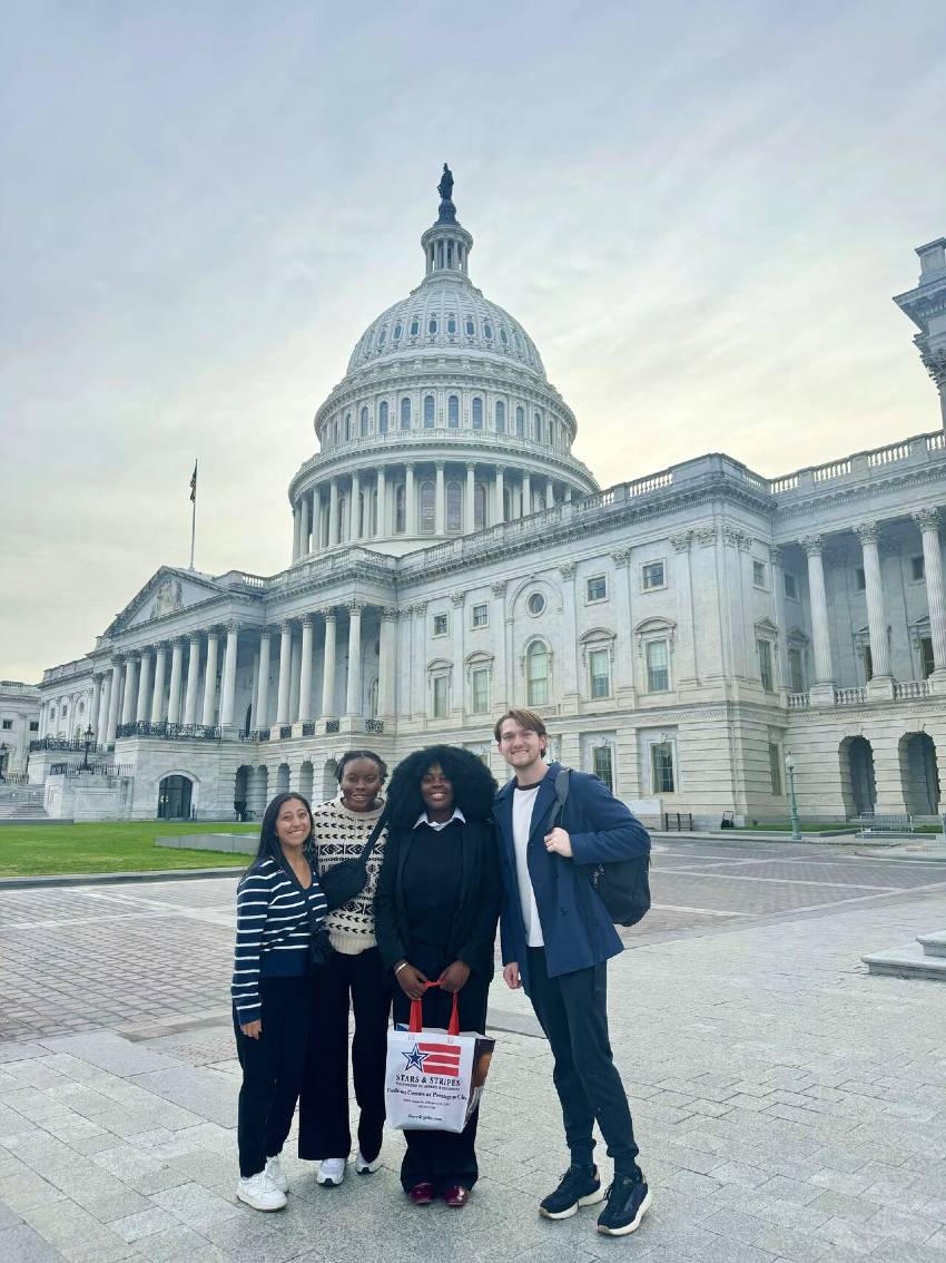 Students standing in front of the US Capitol. 