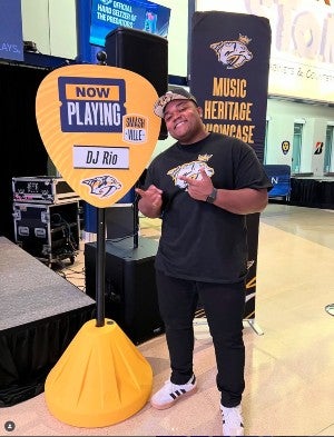 Jalen Anderson at his booth at the Predators stadium