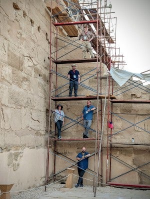 The Lanier team on a scoffold by the temple walls