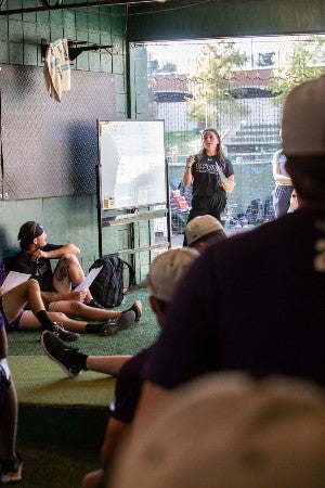 A 2025 student dietetic intern presenting nutrition info to the Lipscomb baseball team