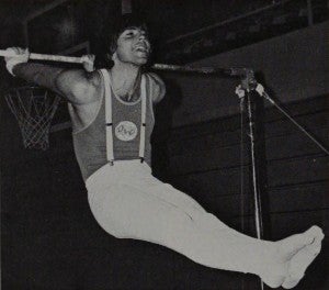 Drew Davis competing on the high bar