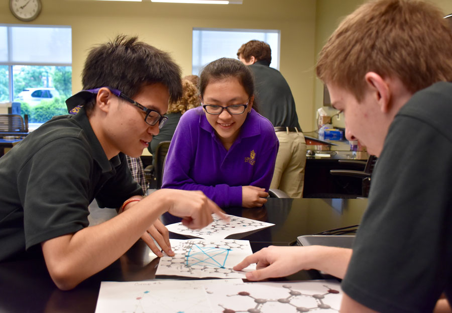 Lipscomb Academy students work on a project together