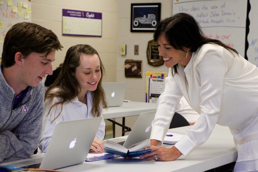 Three students at table