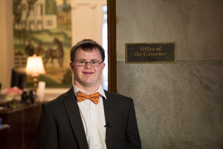 Jason Roger outside the governor's office during his internship there