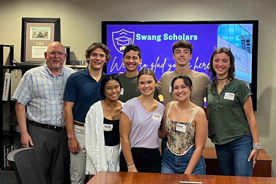 College of Business Dean Ray Eldridge with the Swang Scholars