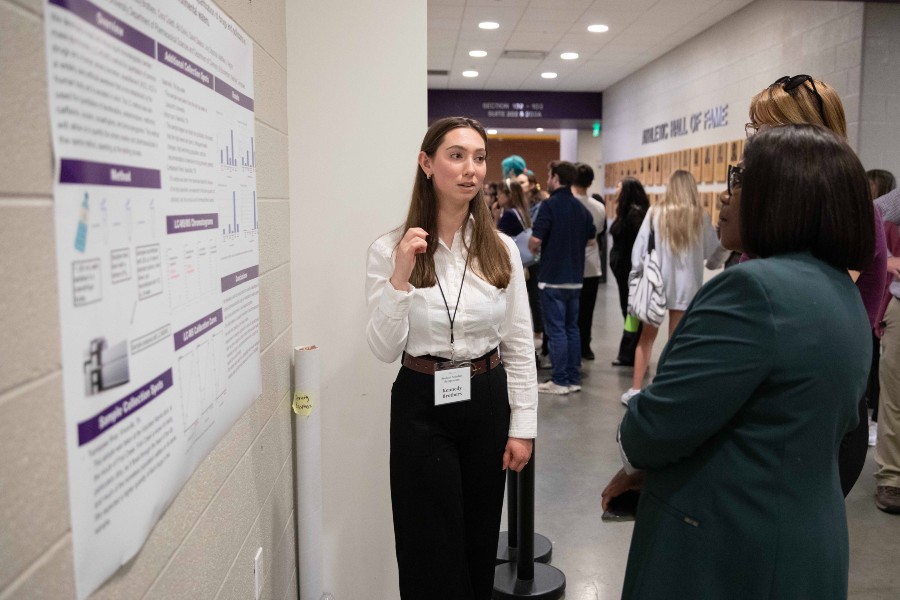 Honors student Kennedy Brothers presenting research at Lipscomb's Student Scholars Symposium. 