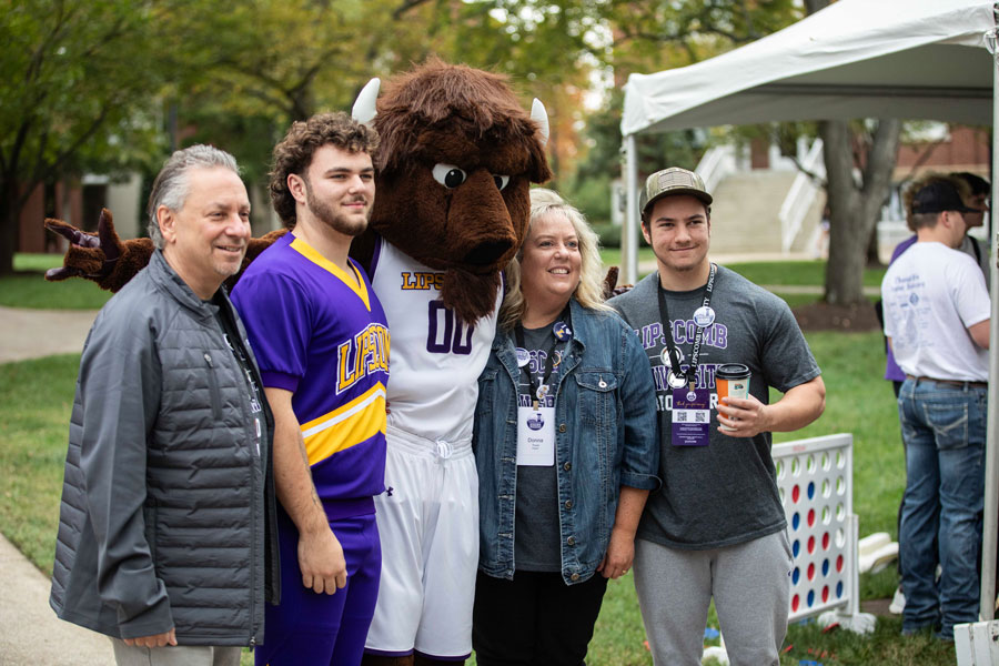 Family with Lou Bison in Bison Square..