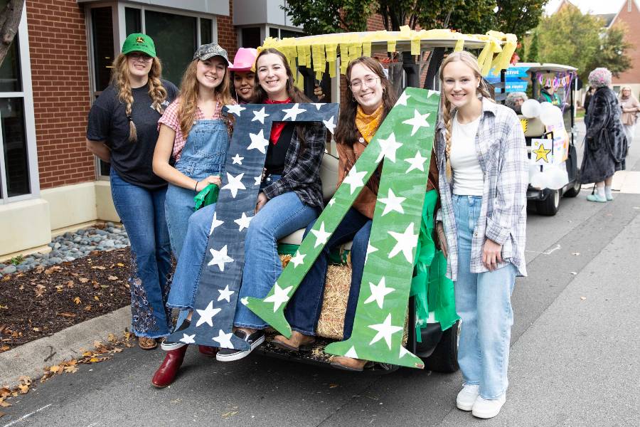 Members of Gamma Lambda before the Bisons Weekend parade