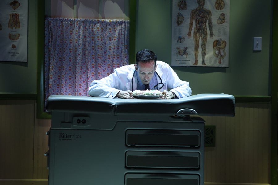 Doctor Jim Pomatter looking over his marshmallow pie in the Nashville Repertory Theatre performance