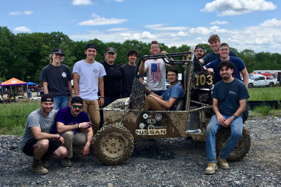 Student on the Baja SAE team from Lipscomb with their ATV