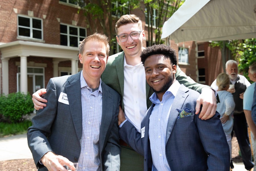 Bennie Harris with faculty and alums