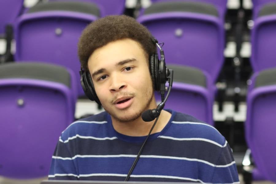 Brandon Bigsby broadcasting a game in Allen Arena. 