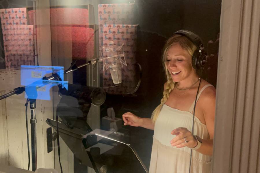 Singer/songwriter Ellie Holcomb at a recording session voicing the character of Mary. 