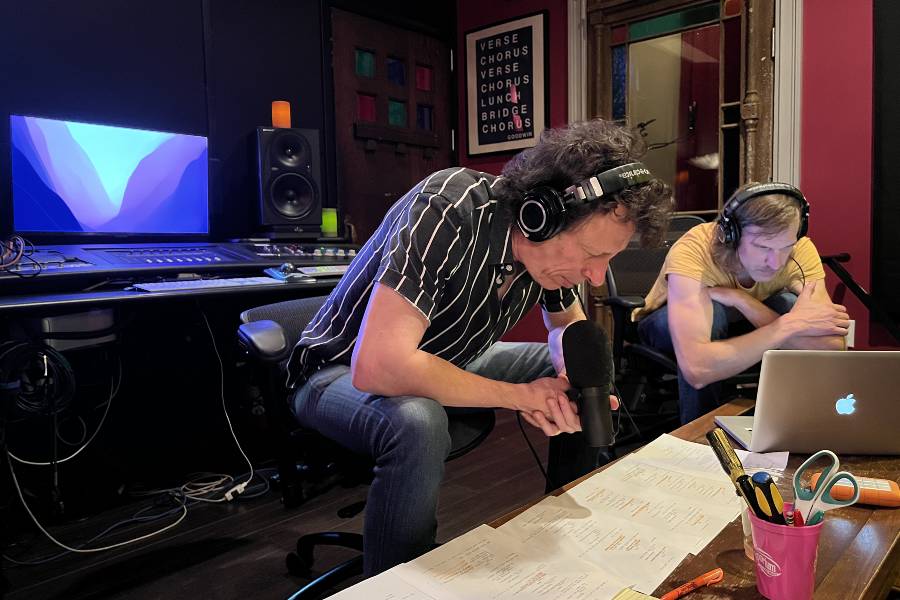 Taylor in the studio reviewing music for the series. 