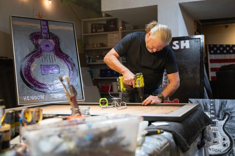 Rob Hendon working on a frame in his studio