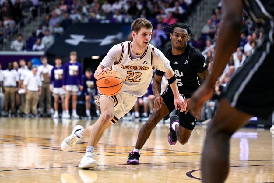 Joe Anderson dribbling the basketball