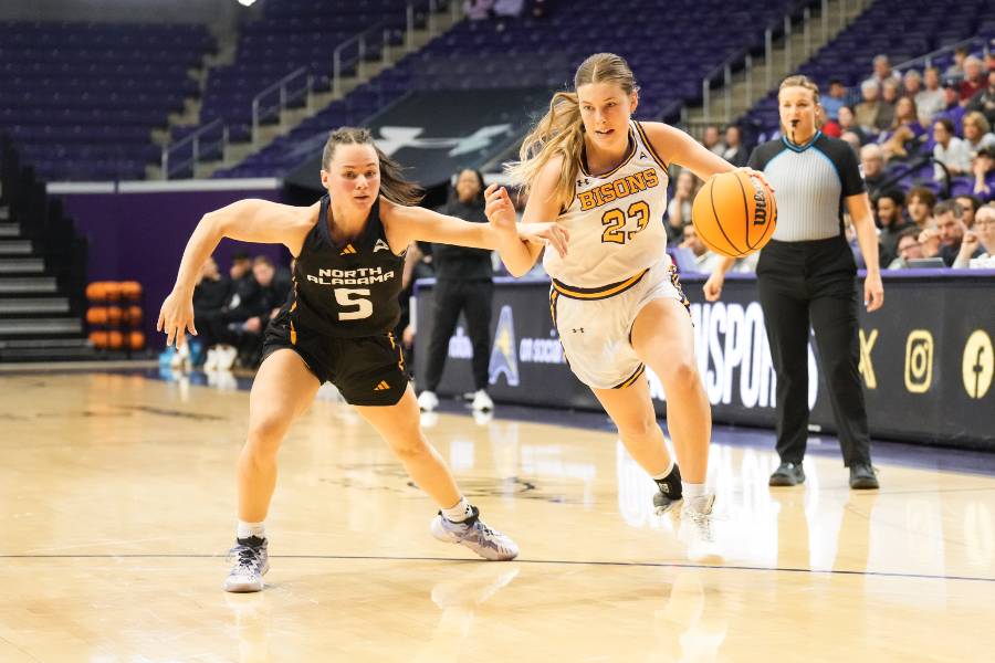 Jalyn Holcomb driving toward the basket. 