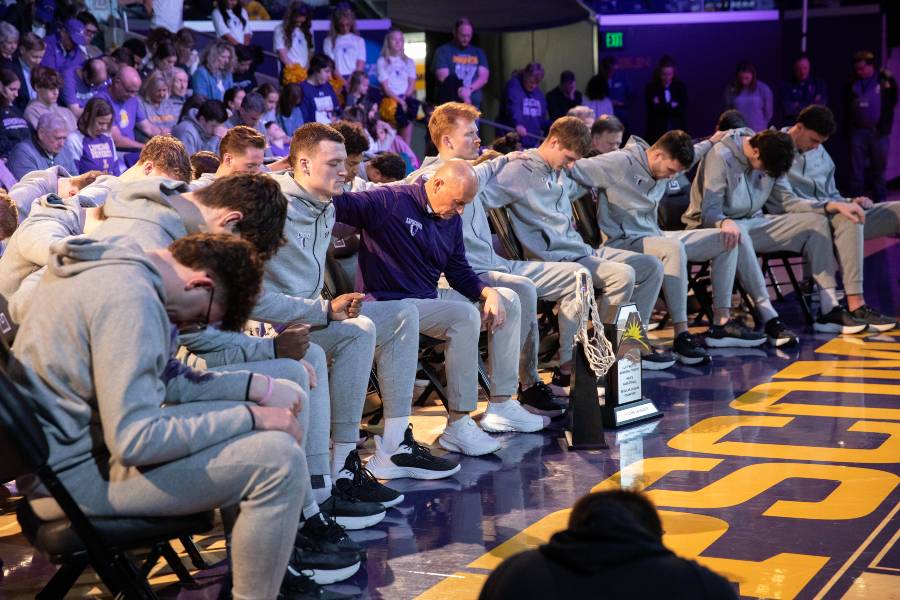 Team praying together