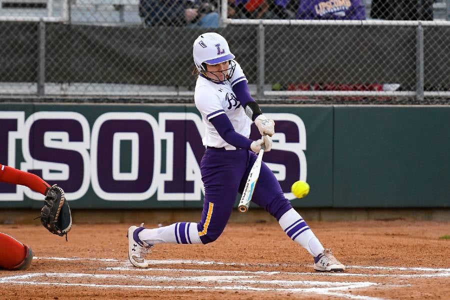 Elise Shewmaker swinging the bat on Draper Diamond.