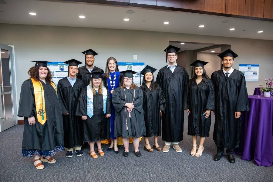 President McQueen with the 2025 IDEAL program graduates.