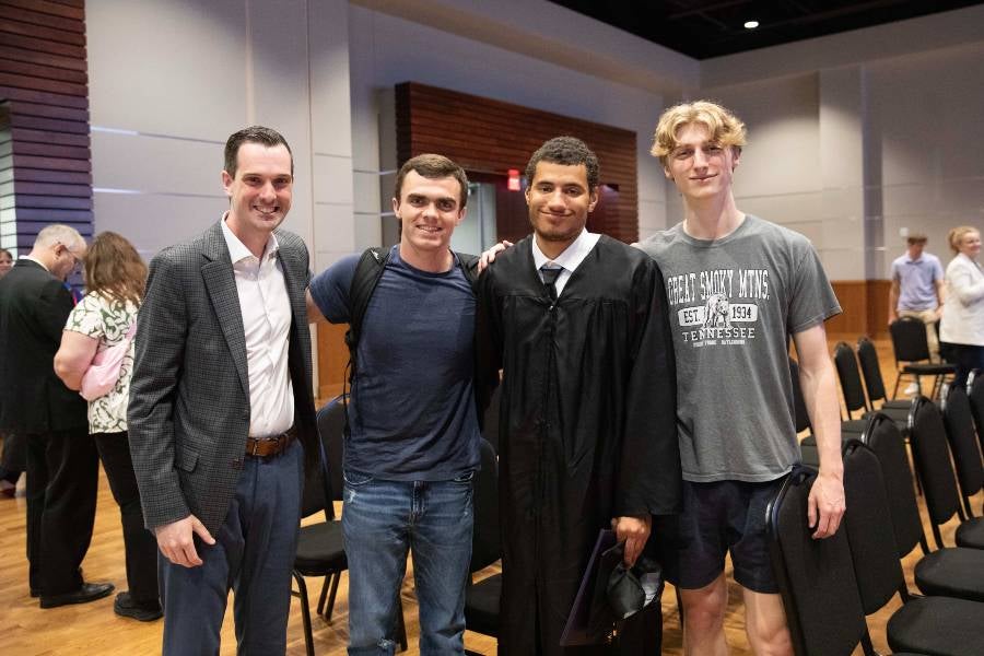 IDEAL graduates celebrate after the ceremony.