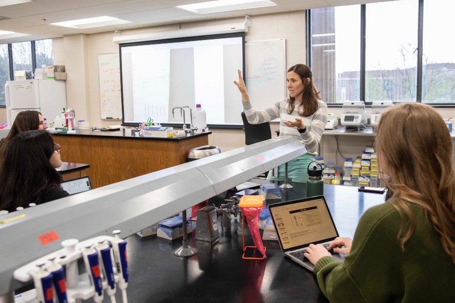 Beth Conway teaching in the biology lab