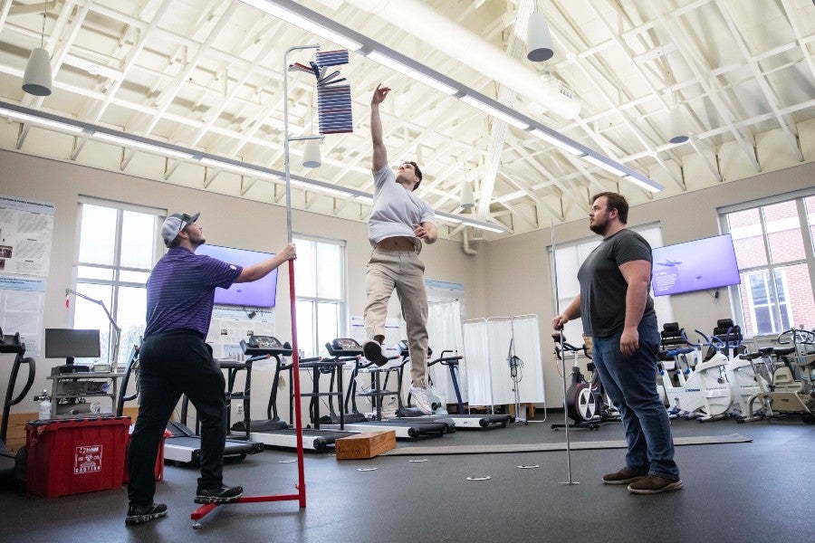 Students carry out research project in human performance lab
