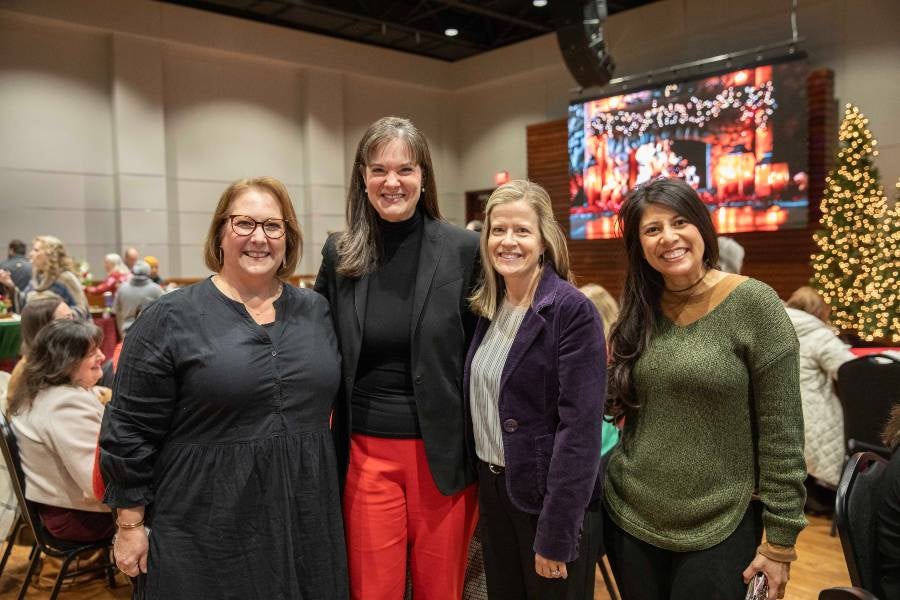 President McQueen with faculty and staff