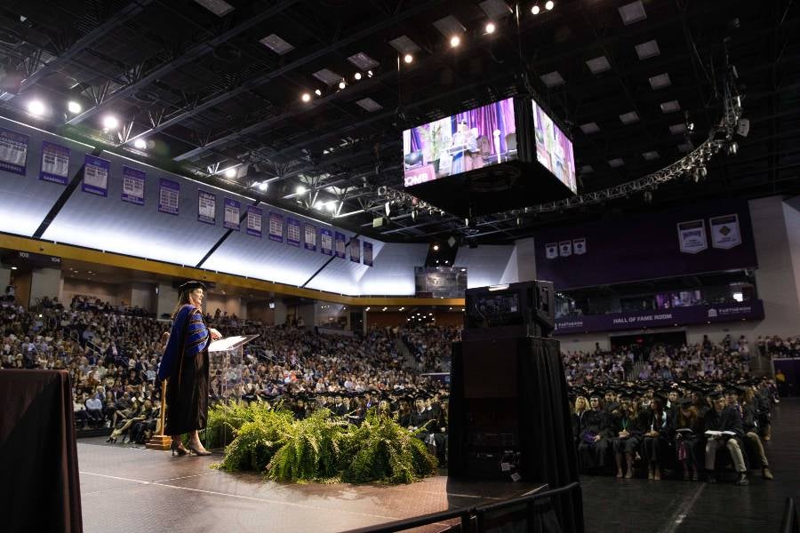 President McQueen speaking at graduation.