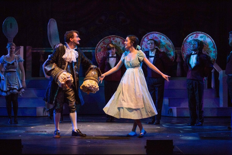 Students on stage in the 2019 production of Beauty and the Beast