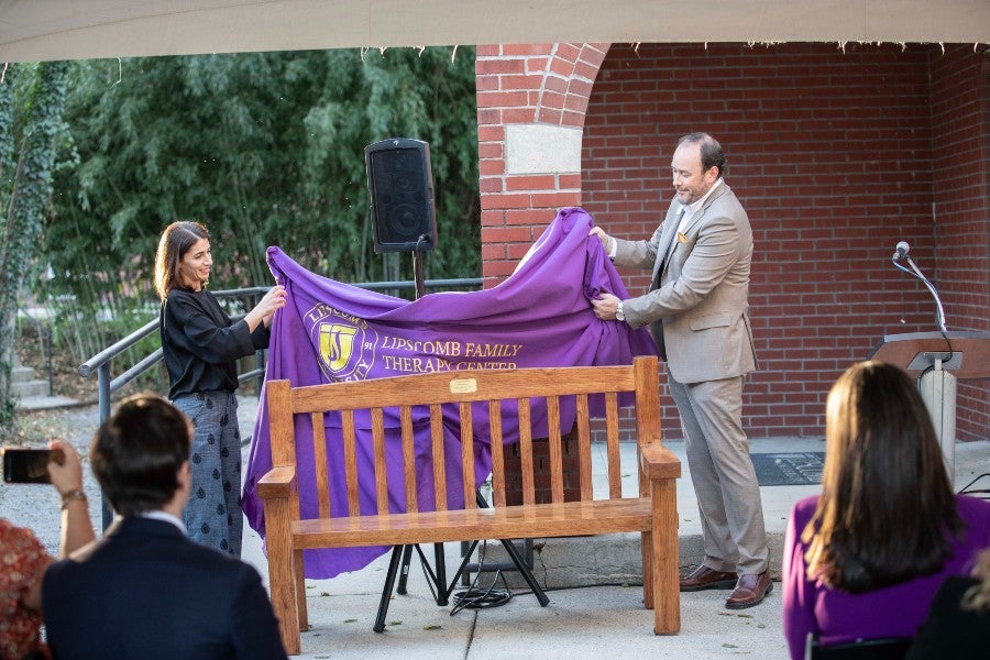 The unveiling of the donated bench at the reunion