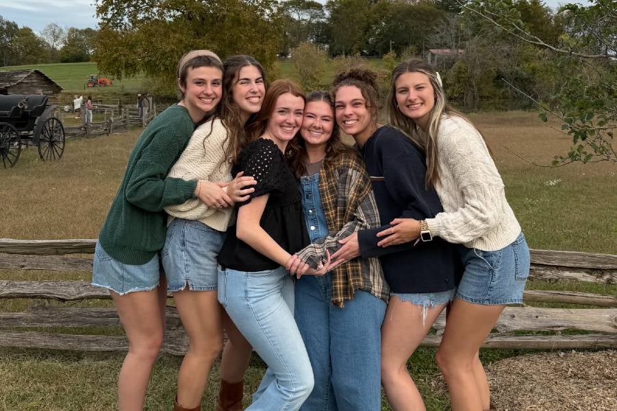 Chloe with her friends outside. 