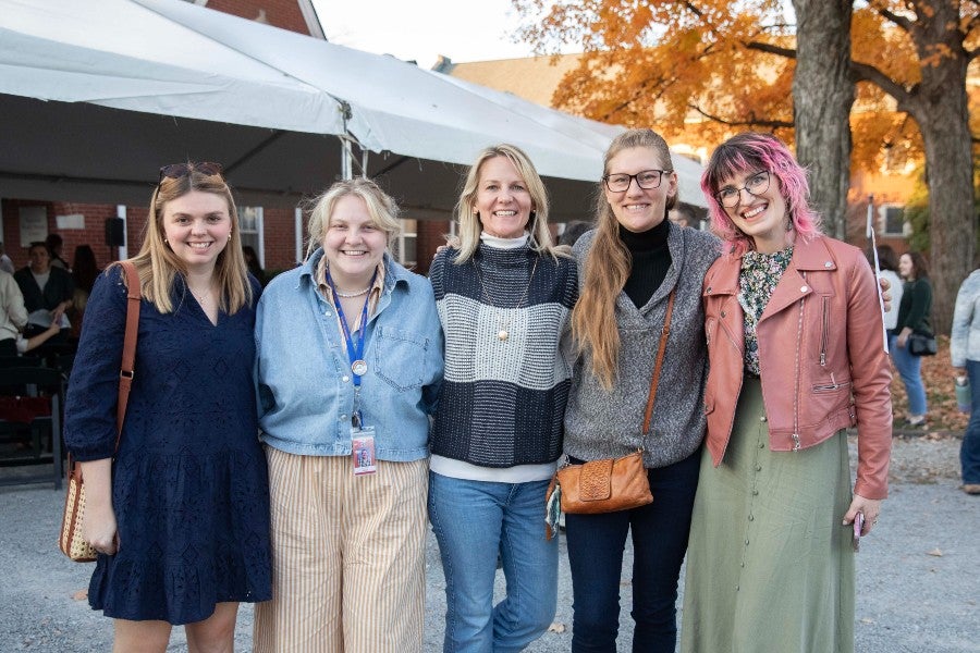 Several alums at the reunion taking a group photo