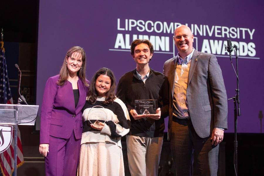 President Candice McQueen and Brian Mast, senior vice president of student affairs, recognize Amada Lashmit-Pena and Lucas Collins at Bisons Weekend 2025. 