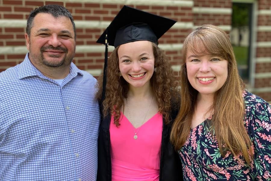 Trevathan with husband, David, at their daughter, Katie's graduation from Lipscomb in 2023. 