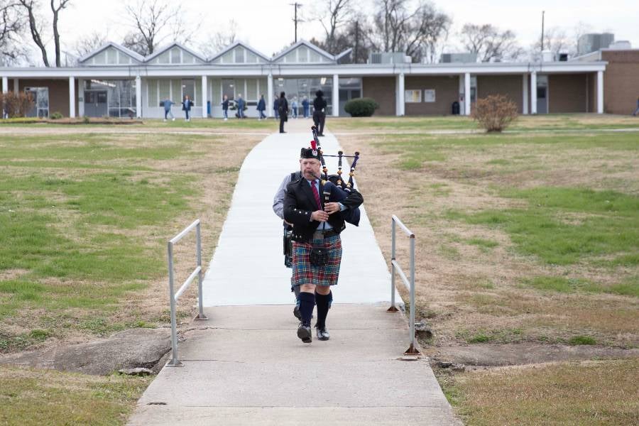 Bagpiper on the grounds of the Debra K. Johnson Rehabilitation Center.