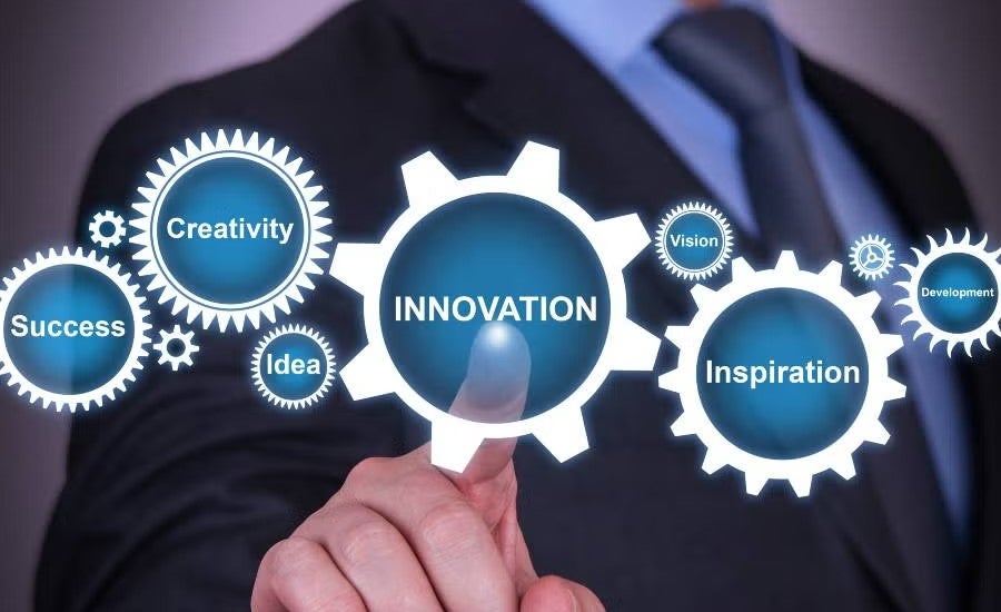 Hand pointing at the word innovation. 