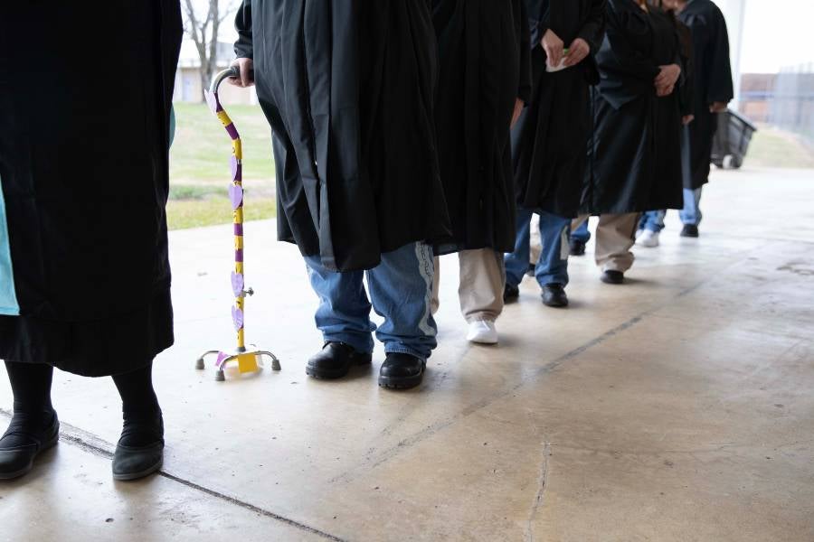 Graduates walking in. 