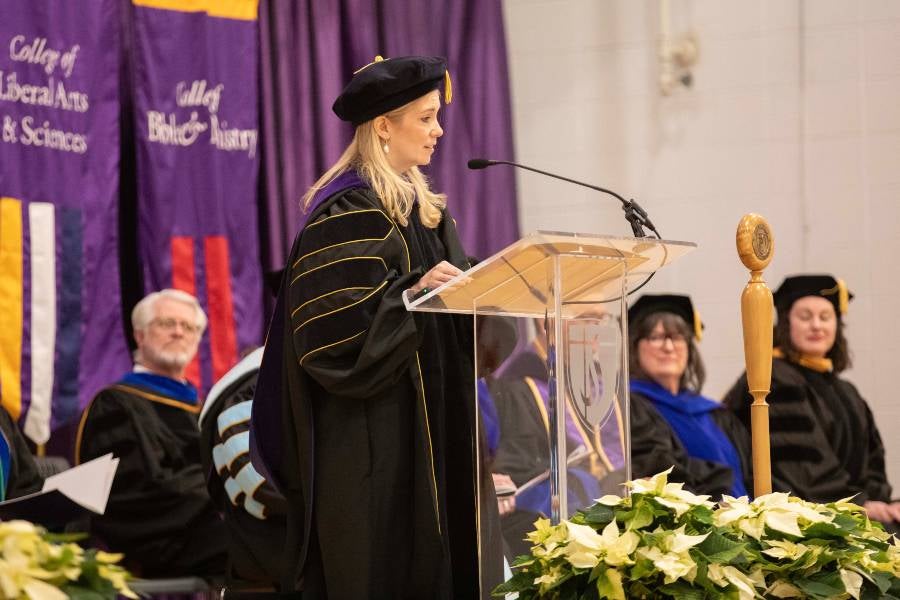 Kimberly McCall delivers the faculty charge to graduates. 