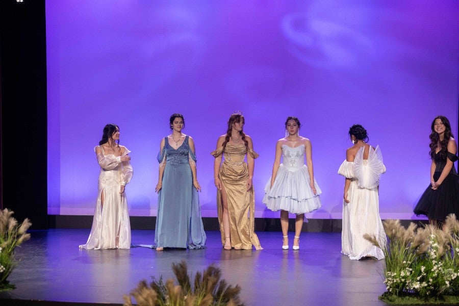 Models displaying Anderson's design at her senior fashion show at Lipscomb